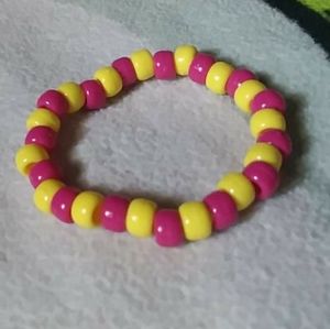 dark pink yellow kandi bracelet